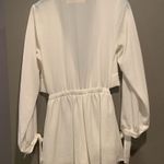 Reverse White Cutout Romper Photo 2