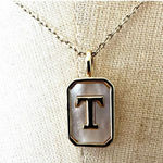Gold tone and opal T monogram pendant necklace Photo 0