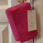 A New Day 🩷 a . new day Wristlet 🩷 Photo 0