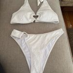 Zaful Chic cream bikini with heart accents. Halter top and matching bottoms. Perfect for beach days. Photo 3