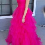 Hot pink strapless prom dress Photo 1
