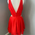 Sherri Hill short red dress with cutouts and a sheer neckline Photo 5
