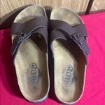 Dark Brown Cross Photo 1