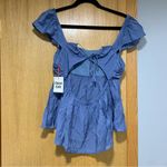Open Edit  Blue Blouse with a Back Cutout - Size Large Photo 1