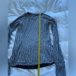 Lululemon Women’s  Gray Long Sleeve activewear shirt with zippered pockets Photo 1