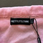 Pretty Little Thing  Pink toweled short sleeve button up Photo 1