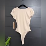Almost Famous  Champaign Silky Short Sleeve 1 Piece Bodysuit Women’s Sz S NWT Photo 4
