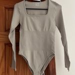 Amazon OQQ  Bodysuit Photo 0