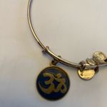 ALEX AND ANI Om Symbol Russian Gold Adjustable Charm Bangle Bracelet Photo 2