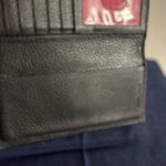 Dooney & Bourke Luca Continental Black Italian Pebbled Leather Red Lined Wallet Photo 6