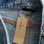 American Eagle Denim Distressed Super Stretch Hi-Rise Shortie Rolled Hem Shorts Photo 4