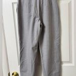 EXPRESS Light Gray Pleated Pants Photo 1