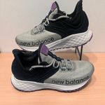 New Balance Black and White Sneakers with Purple Accents Photo 1