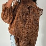 ee:some Cheetah print top Photo 1