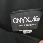 Onyx Nite black dress size 10. Photo 1