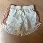 Nike Cream and Tan Athletic Shorts Lightweight Elastic Waistband Photo 0