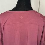 Lululemon PINK ASYMETRICAL TIE FRONT LONG SLEEVE BLOUSE Photo 1