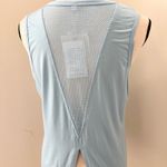 Mippo Womens Size M Mesh Split Back Crew
Neck Athletic Tank Top Powder Blue NEW Size M Photo 4