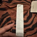 Fabletics Oasis PureLuxe High-Waisted Twist 7/8 Legging Photo 7