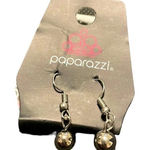 Small silver colored earrings new with original packaging Photo 0