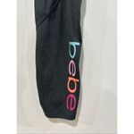 Bebe  Women’s Large Black High Rise Leggings with Pockets Logo Activewear Photo 3