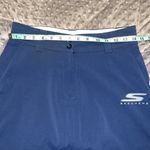 Skechers  performance go golf skorts size 4 button zip closure with pockets Photo 1