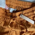 Burnt orange shorts. Size medium. Tags still on Photo 2