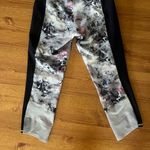 Lululemon Lulu leggings. Floral print, gray, black and pink. Photo 1