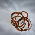 Riah Fashion Orange and Gold Beaded Bracelet Set Photo 1