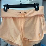Free People ORANGE  MOVEMENT Women's Shorts Photo 0