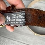 Brighton  leather and brass fish embellished belt on woven cotton Photo 4