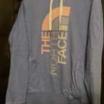 The North Face Hooded Sweatshirt Photo 0