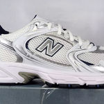 New Balance Women's size 8/Mens size 6.5  530 White Blue Silver Photo 0