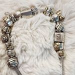 Pandora and Chamilia silver and gold bracelet with 16 charms/spacers Photo 6