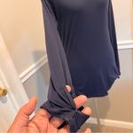 Athleta  Womens Size Medium Stratus  Long Sleeve Blue Solid Relaxed thumbhole Photo 1
