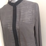 Sheer gray tunic top with black trim Photo 0