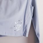 Athleta Long Sleeve Perforated Floral Reflective Sports Top Photo 3