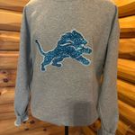 NFL Detroit lions sweater! Gray Sweatshirt with Blue Glitter Logo! Size large Photo 2