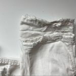 American Eagle  Outfitters • White Destructed Mom Jeans Photo 1