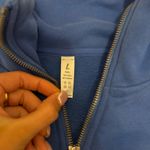 Amazon Blue quarter zip jacket Photo 1