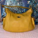 Dooney & Bourke Vintage Mustard Leather Hobo Bag Photo 0