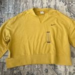 Nike  Women’s ripped Style Sweatshirt Yellow Photo 0