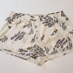 Calia by Carrie Calia Women’s Mid Rise Relaxed Zipper Pocket Infinity Waistband Run Shorts Photo 0