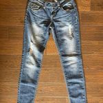 Almost Famous Women's Size 7 Distressed Ripped Lace Trim Low Rise Jeans Photo 0