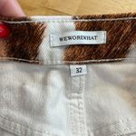 We Wore What  Brown and White Cowhide Pattern Bootcut Jeans Photo 2