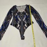 Free People  Pick A Place Bodysuit Long Sleeve Sz XS Midnight Combo Blue Pattern Photo 1