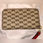 Michael Kors Monogram Wallet EUC with removable wrist strap Photo 2