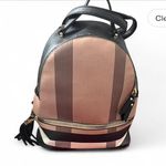 Black and tan backpack Photo 0