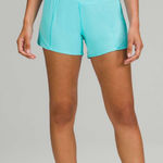Lululemon Hotty Hot Low-Rise Lined Short 4" in Electric Turquoise Size 6 Photo 0