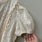 Industry Embroidered Eyelet Puff Sleeve Button Photo 1